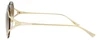 Side View of GUCCI GG0645S-002 Womens Rimless Designer Sunglasses in Gold/Brown Gradient 57mm