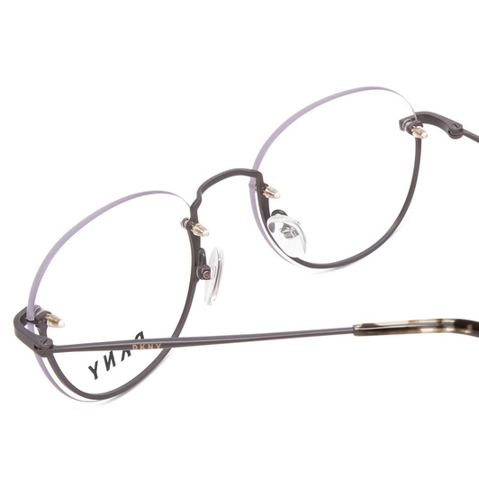 Close Up View of DKNY DK1000 Designer Single Vision Prescription Rx Eyeglasses in Satin Grey Tortoise Ladies Round Semi-Rimless Metal 52 mm