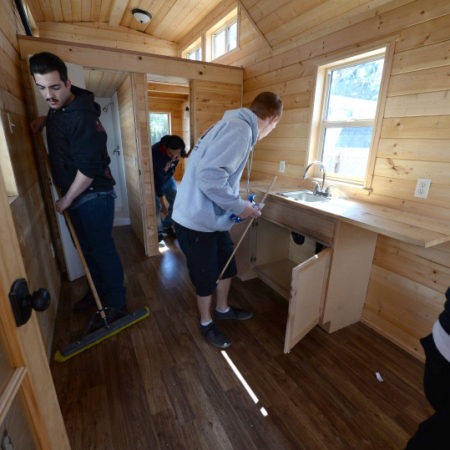 Concord high schoolers in the tiny house they built