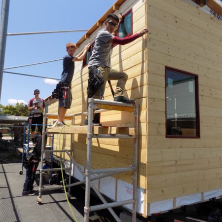 High school students building a tiny house