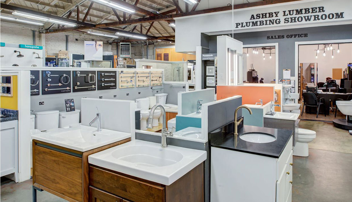 Plumbing showroom showcasing different vanities and bathroom hardware.