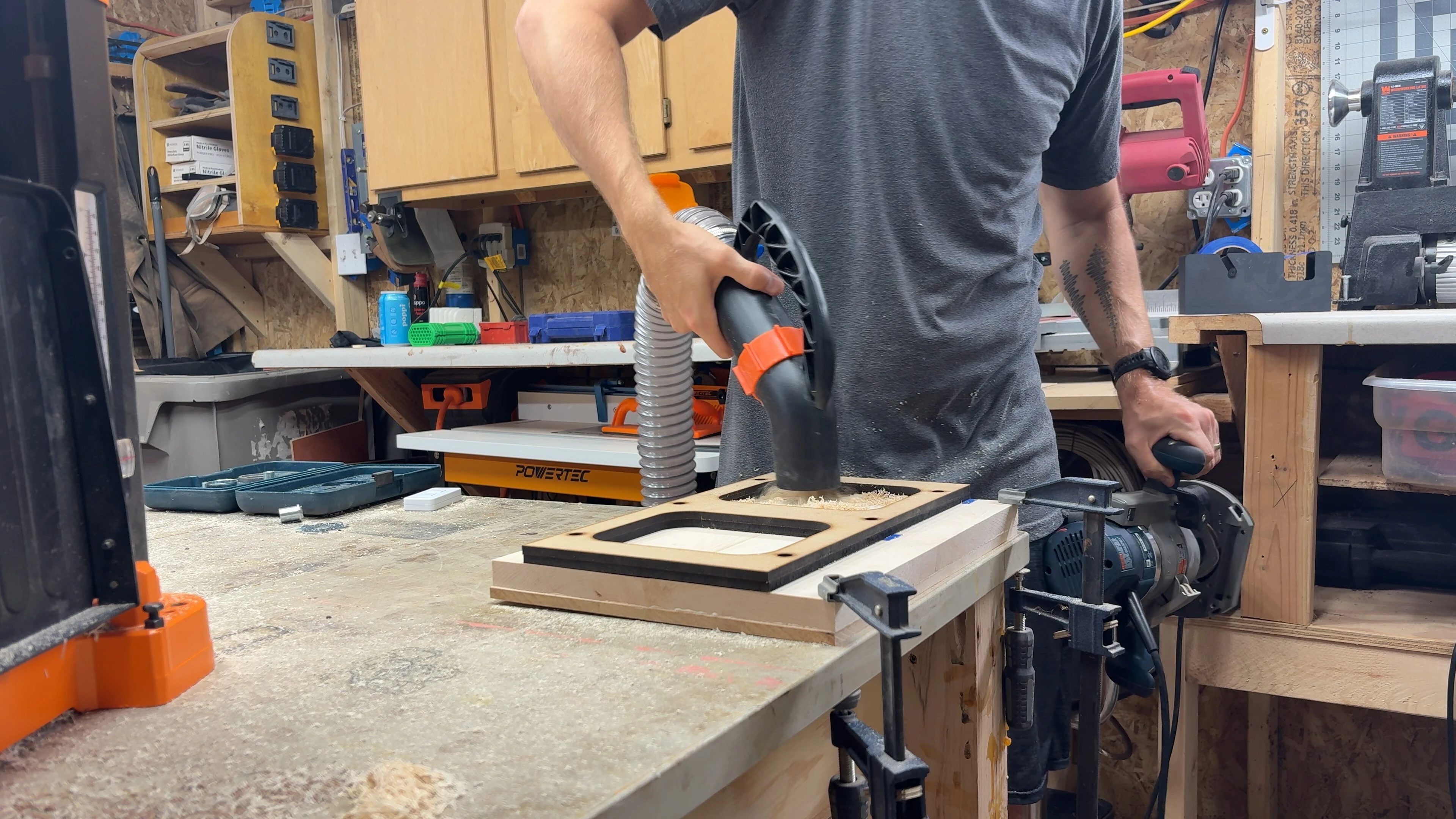 The dust collection system capturing debris during Chandler's checkerboard build