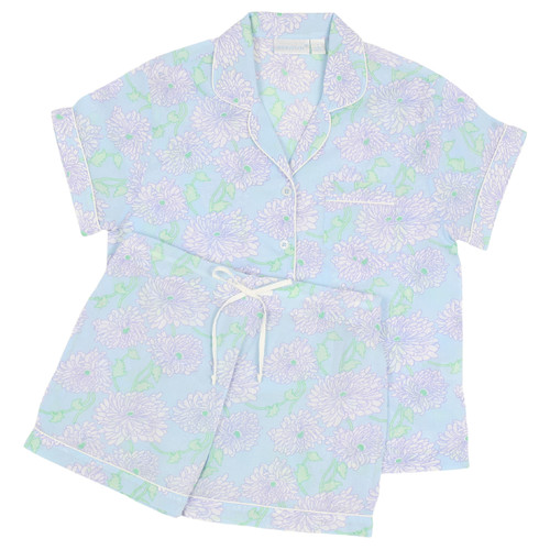 Women's cotton voile button-down short sleeve pajama with shorts.  Blue floral pattern. Two-piece pajama set folded flat.