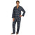 Woman in a long sleeve plaid flannel pajama set made of 100% soft cotton 