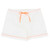Close up of white cotton poplin pajama shorts lying flat. Trimmed with orange piping and short ties. 