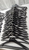 Lot of 34 Black Plastic Coat Hangers