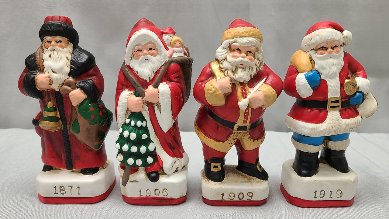 4 Porcelain Santa Figurines - 1871, 1906, 1909, 1919