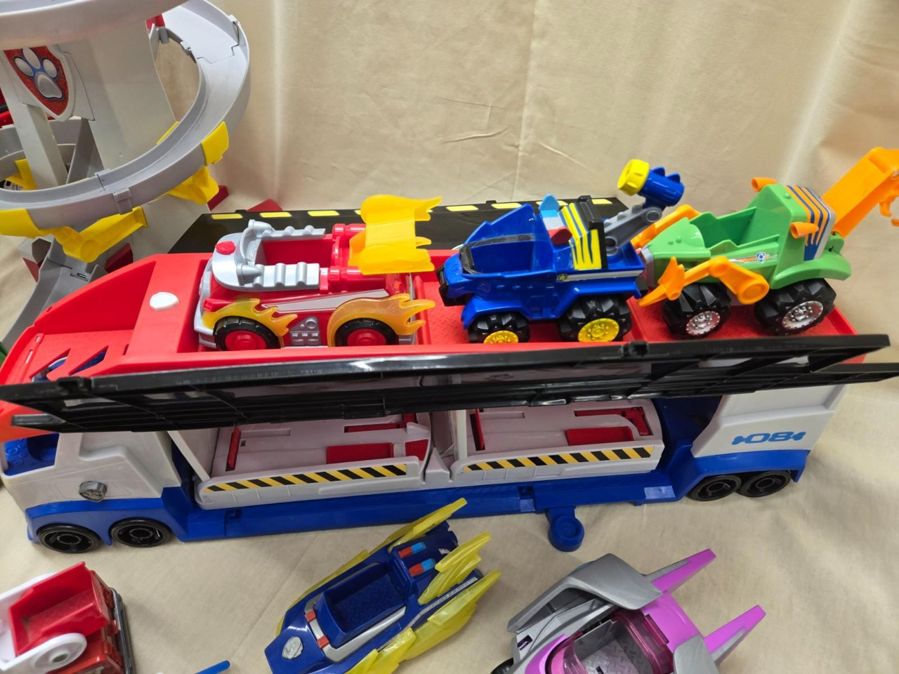 Huge Lot of Paw Patrol Toys Fire Truck Semi Cars Figurines Movies Huge Lot of Paw Patrol Toys Fire Truck Semi Cars Figurines Movies