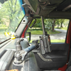 Baofeng UV-5R Mini secured in 4X3D ball mount adapter on Jeep JK windshield bar interior view
