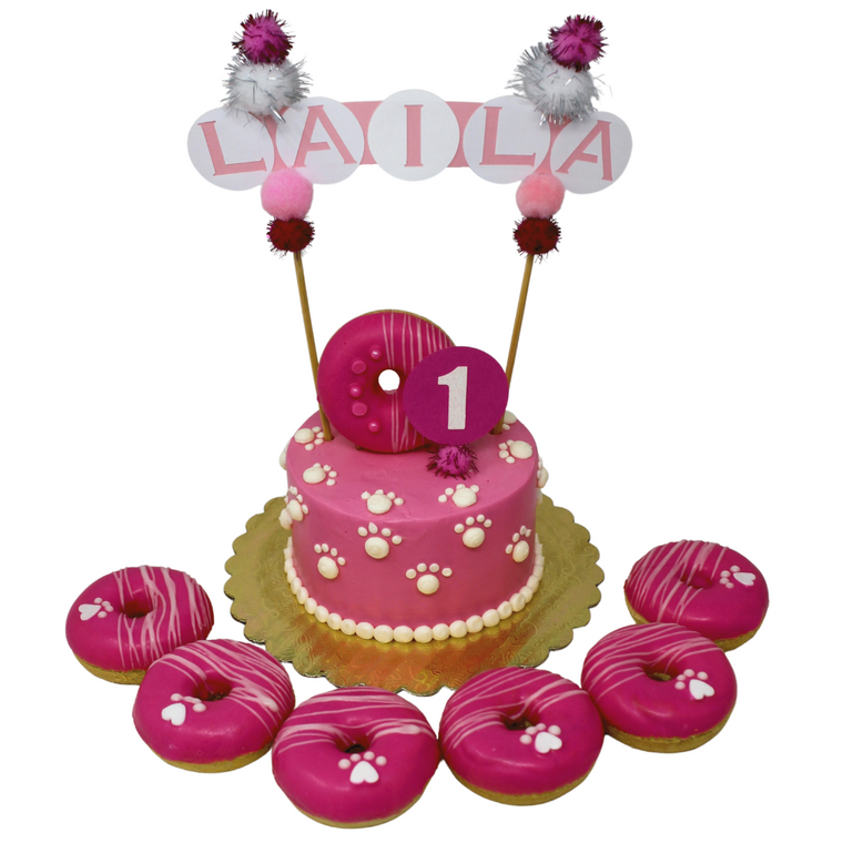 custom pink theme with donut topper + 6-pack party donuts