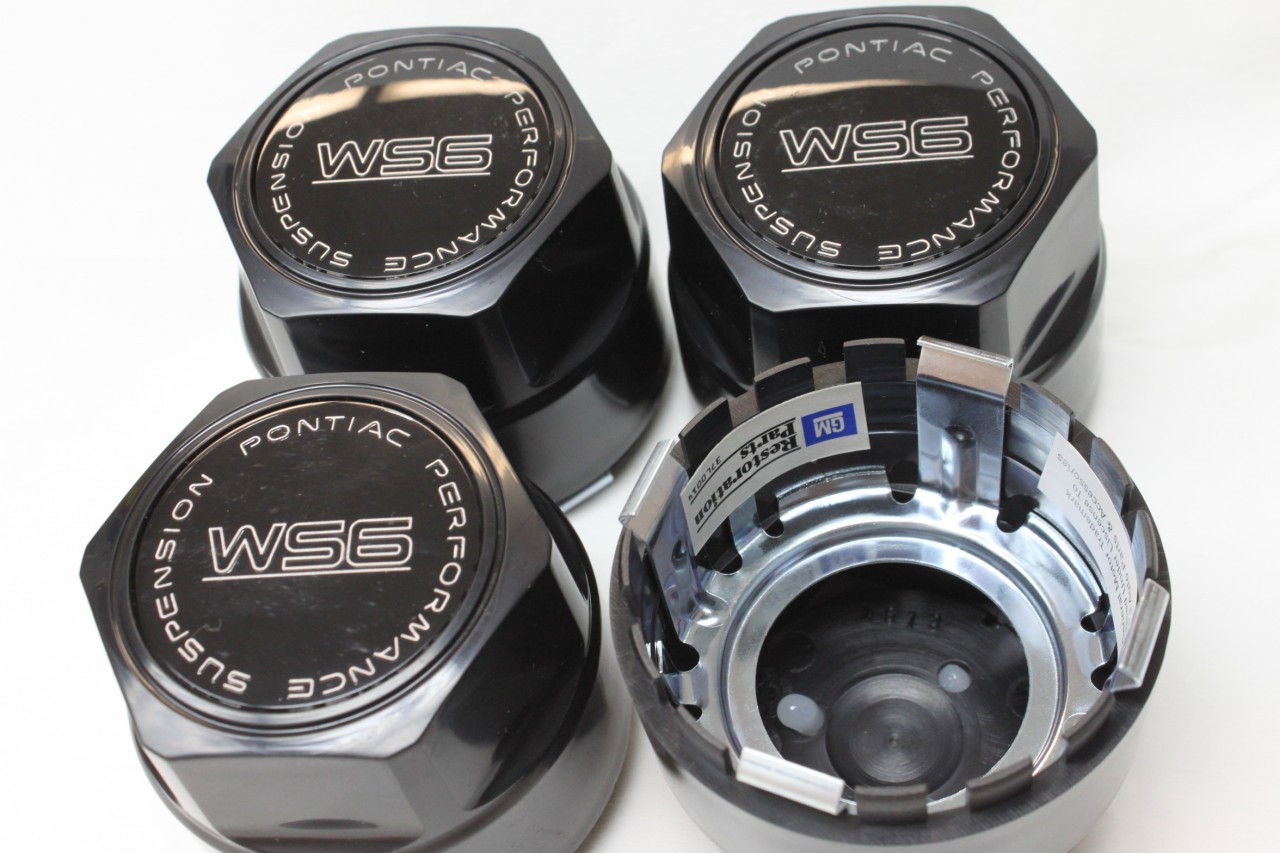 thumbnail image 2 of GM Restoration 1988-1992 Pontiac Firebird WS6 Wheel Center Hub Caps – Black Gold Set Of 4 2 of 4
