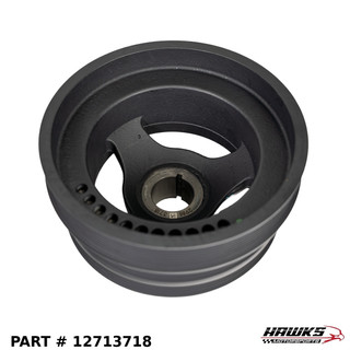 Front face of Genuine GM 12713718 LT4 harmonic balancer showing the keyed crankshaft hub, three-spoke design and rim markings