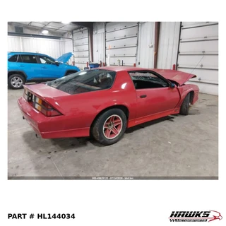 Passenger side overview of 1987 Chevrolet Camaro donor parts car, stock HL144034
