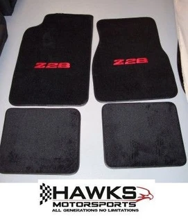 Driver and passenger molded ACC front floor mats for fourth-generation Chevrolet Camaro with red emblems.