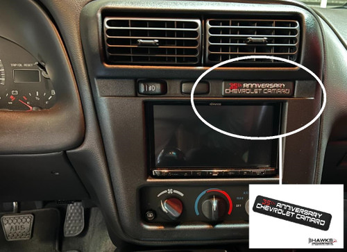Close-up of the EM21812R 35th Anniversary dashboard plaque for a 2002 Chevrolet Camaro