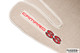 Red embroidered Camaro SS logo detail on a Neutral Tan ACC front floor mat
