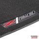Embroidered Camaro Z28 logo detail on a Graphite Gray Hawks carpet floor mat