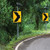 Solar LED Chevron Sign Alert Dynamic Curve Warning System on a curved roadway