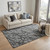 5' X 8' Gray And Charcoal Abstract Washable Area Rug With UV Protection 5' X 8' Gray And Charcoal Abstract Washable Area Rug With UV Protection