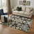 5' X 8' Black Gold And Gray Oriental Washable Area Rug With UV Protection 5' X 8' Black Gold And Gray Oriental Washable Area Rug With UV Protection
