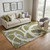 5' X 8' Olive Green Gray And Beige Abstract Washable Area Rug With UV Protection 5' X 8' Olive Green Gray And Beige Abstract Washable Area Rug With UV Protection