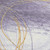 10' X 14' Purple Gold And Ivory Abstract Washable Indoor Outdoor Area Rug 10' X 14' Purple Gold And Ivory Abstract Washable Indoor Outdoor Area Rug