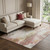 8' X 10' Tan Mauve And Ivory Abstract Washable Area Rug With UV Protection 8' X 10' Tan Mauve And Ivory Abstract Washable Area Rug With UV Protection