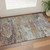 3' X 5' Teal And Orange Abstract Washable Area Rug With UV Protection 3' X 5' Teal And Orange Abstract Washable Area Rug With UV Protection