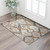 3' X 5' Rust Charcoal And Beige Ikat Washable Area Rug With UV Protection 3' X 5' Rust Charcoal And Beige Ikat Washable Area Rug With UV Protection