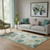 5' X 8' Teal Green And Ivory Geometric Washable Area Rug With UV Protection