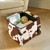 15" White and Brown Faux Fur Cow Print Storage Ottoman 15" White and Brown Faux Fur Cow Print Storage Ottoman