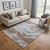 5' X 8' Coffee Blue And Ivory Abstract Washable Area Rug With UV Protection 5' X 8' Coffee Blue And Ivory Abstract Washable Area Rug With UV Protection