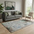 5' X 8' Taupe Brown And Ivory Abstract Washable Area Rug With UV Protection 5' X 8' Taupe Brown And Ivory Abstract Washable Area Rug With UV Protection