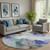 8' Brown And Teal Abstract Washable Round Rug With UV Protection 8' Brown And Teal Abstract Washable Round Rug With UV Protection
