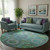 8' Teal And Lime Green Geometric Washable Round Rug With UV Protection