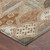 10' X 14' Orange And Chocolate Geometric Washable Indoor Outdoor Area Rug