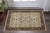 3' X 5' Ivory Red Green Grey Blue And Navy Oriental Power Loom Stain Resistant Area Rug With Fringe