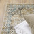 5' X 7' Grey Blue Beige And Gold Oriental Power Loom Stain Resistant Area Rug 5' X 7' Grey Blue Beige And Gold Oriental Power Loom Stain Resistant Area Rug