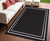 4' X 6' Black And Ivory Indoor Outdoor Area Rug 4' X 6' Black And Ivory Indoor Outdoor Area Rug
