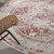 6' Ivory Red And Brown Floral Distressed Round Rug