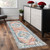 8' Teal Taupe and Rust Geometric Distressed Runner Rug With Fringe