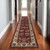 8' Red And Ivory Oriental Runner Rug 8' Red And Ivory Oriental Runner Rug