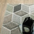 7' X 10' Ivory Gray And Charcoal Geometric Area Rug