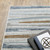 10' X 13' Grey Blue Ivory Brown Beige And Navy Abstract Power Loom Stain Resistant Area Rug 10' X 13' Grey Blue Ivory Brown Beige And Navy Abstract Power Loom Stain Resistant Area Rug