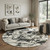 8' Gray and White Round Abstract Power Loom Area Rug 8' Gray and White Round Abstract Power Loom Area Rug