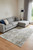 12' X 18' Green Gray And Ivory Abstract Power Loom Distressed Area Rug