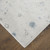 7' X 10' Ivory Blue And Gray Abstract Area Rug