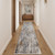10' Gray Ivory and Gold Abstract Power Loom Runner Rug With Fringe 10' Gray Ivory and Gold Abstract Power Loom Runner Rug With Fringe