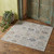 2' X 3' Ivory Taupe and Blue Floral Power Loom Worn Faded Area Rug With Fringe