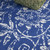 6' X 9' Ivory And Blue Floral Vines Distressed Area Rug 6' X 9' Ivory And Blue Floral Vines Distressed Area Rug